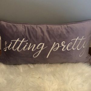 Home goods purple pillow “sitting pretty”